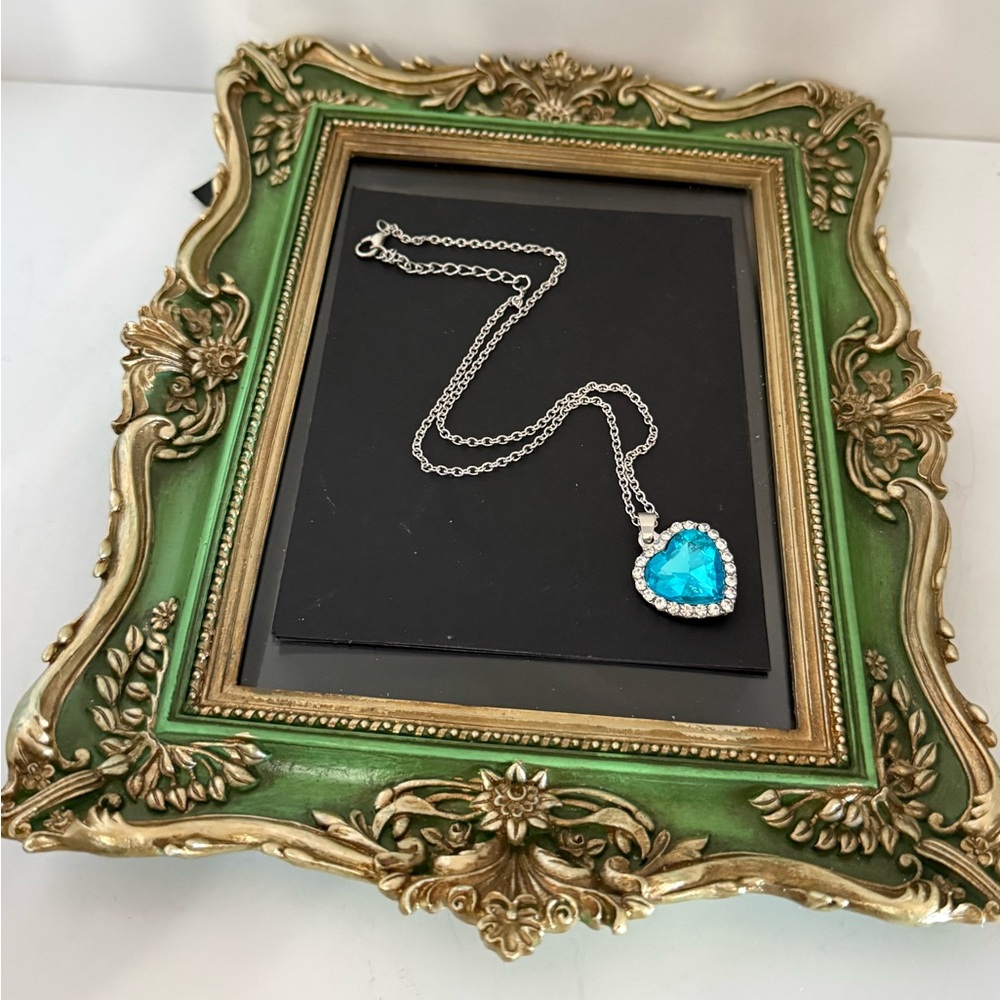 Silver Heart Pendant Necklace with Blue Gemstone